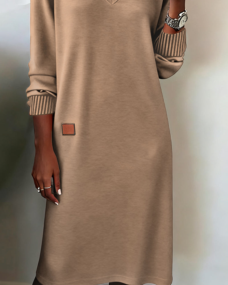 Maglione-abito elegante con scollo a V