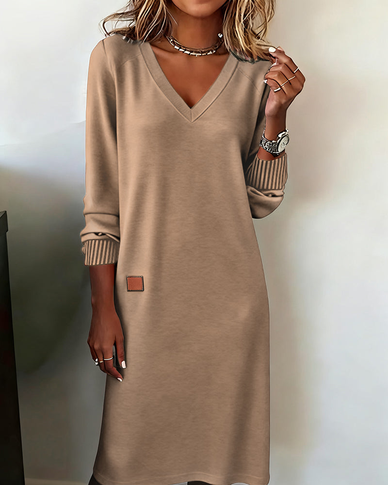 Maglione-abito elegante con scollo a V