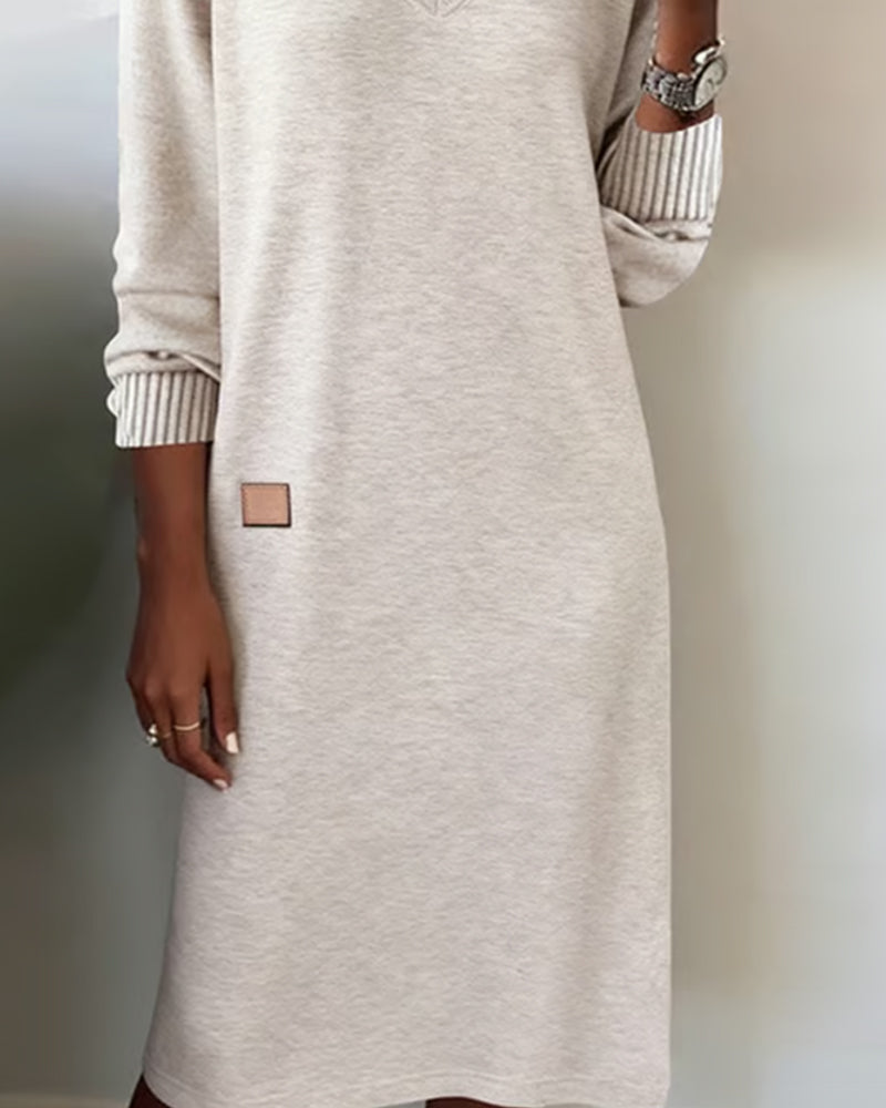 Maglione-abito elegante con scollo a V