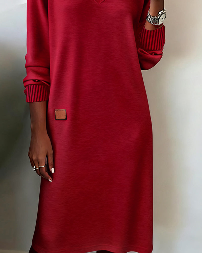 Maglione-abito elegante con scollo a V