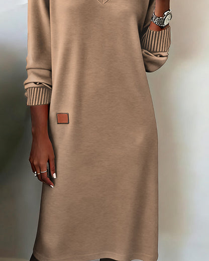 Maglione-abito elegante con scollo a V