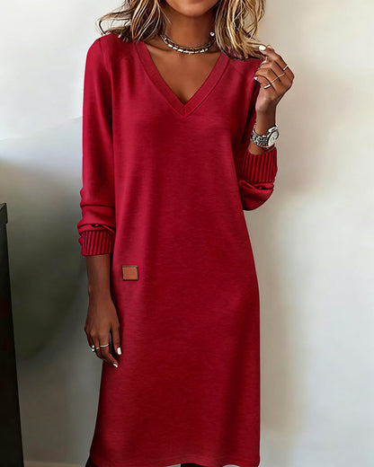 Maglione-abito elegante con scollo a V