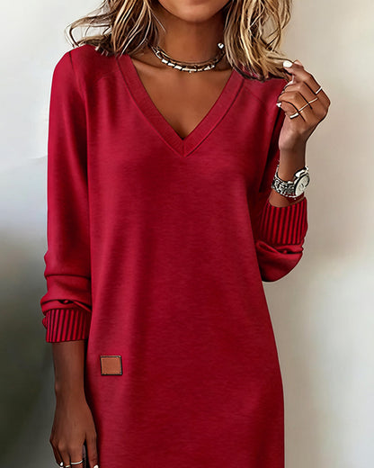 Maglione-abito elegante con scollo a V